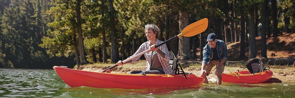 Woman rowing on a lake.